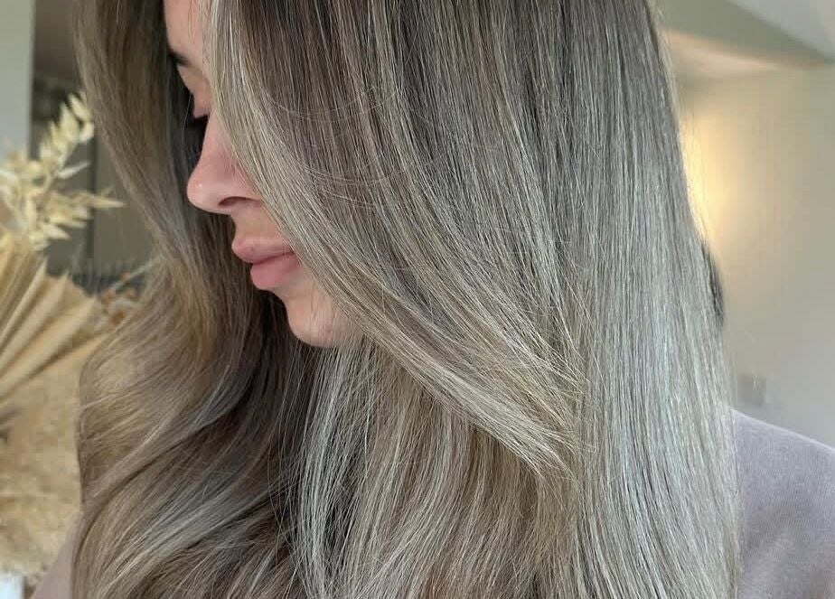 Close-up of smooth, vibrant hair at Jessica Simpson Studio, Tonbridge, England, GB.
