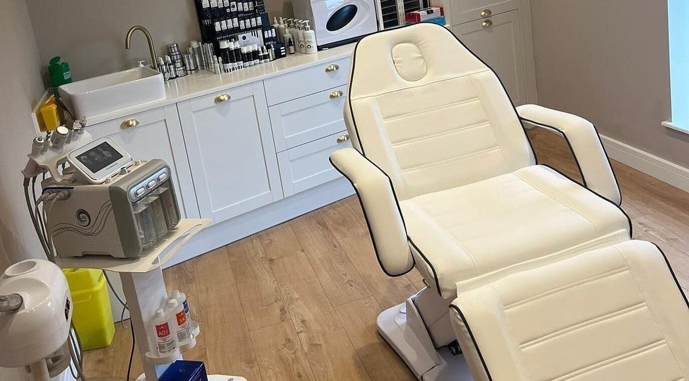 Clean, modern treatment room at Solo House LTD in Skewen, Wales, GB featuring a white treatment chair.