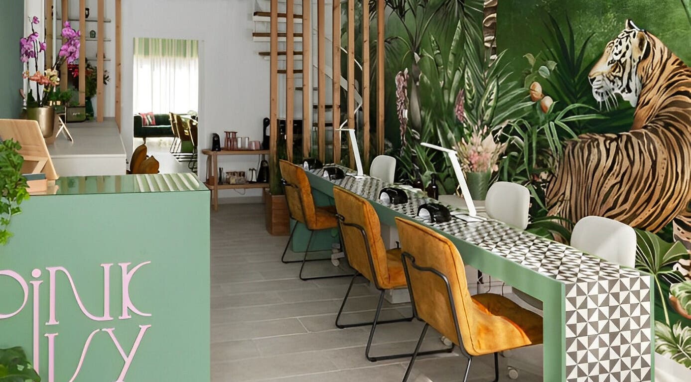 Stylish interior of Pink Ivy with tropical mural and sleek design in Στρόβολος, Λευκωσία, CY.