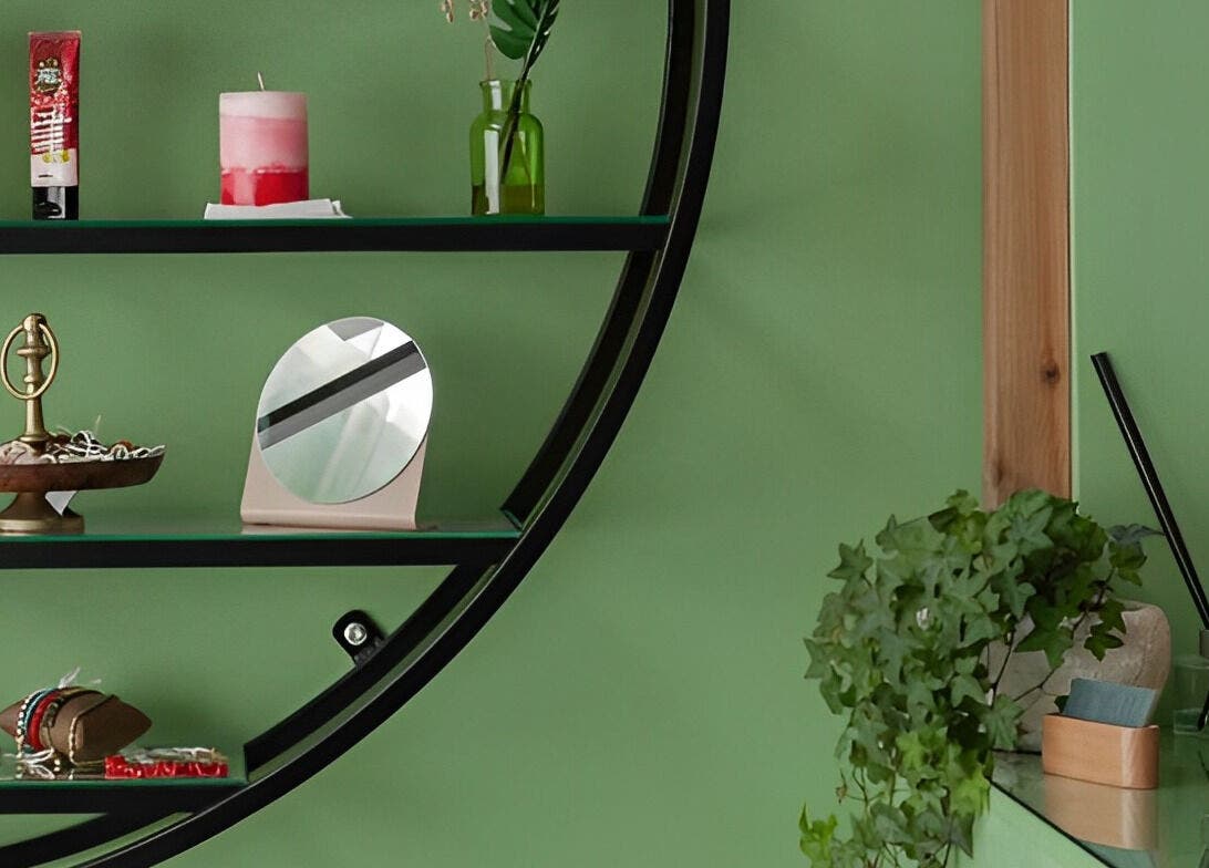 Stylish shelf display at Pink Ivy, Στρόβολος, Λευκωσία, CY, highlights beauty products and greenery.