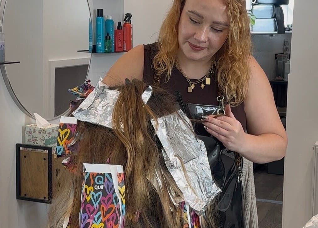 Stylist crafting hair highlights at Science Behind Hairdressing, Wolverhampton, England, GB.