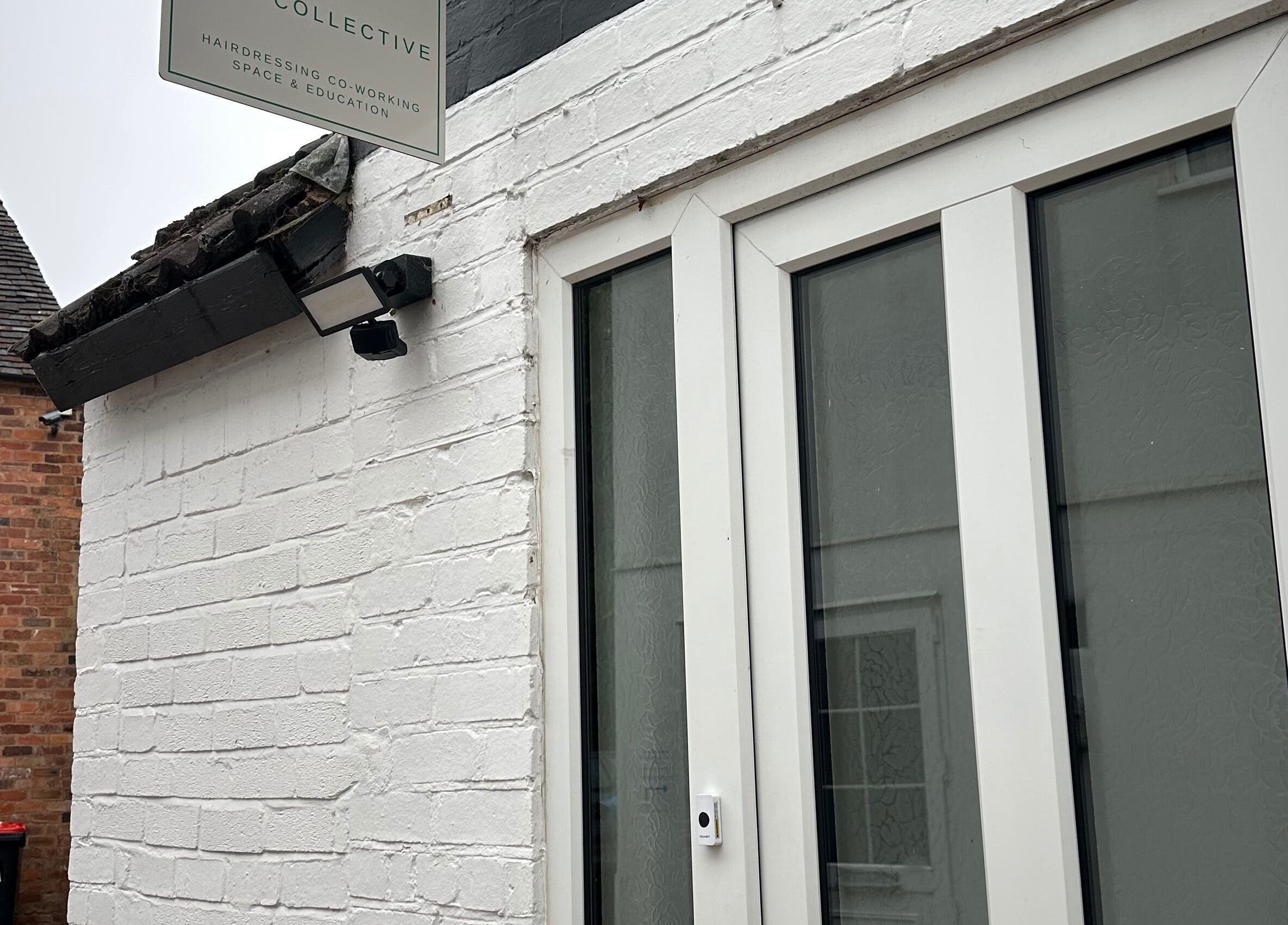 Entrance of Science Behind Hairdressing in Wolverhampton, England, GB showcasing modern style.