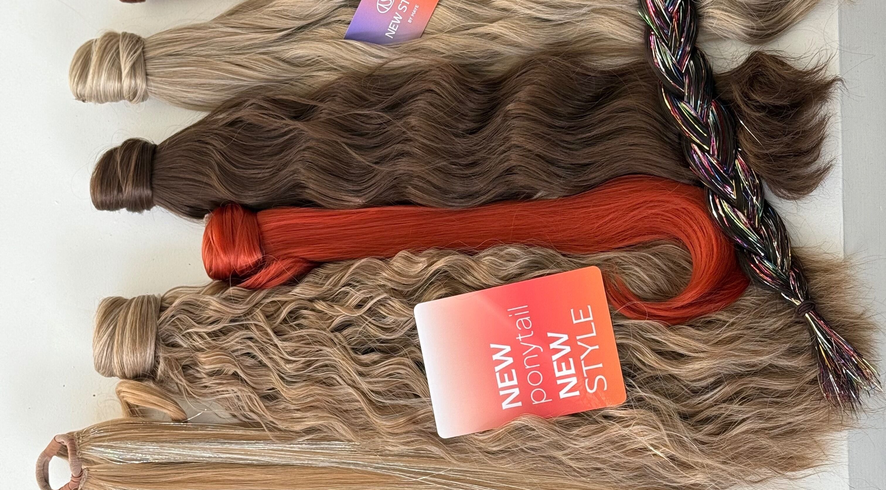 Colorful hair extensions at New Style by Maye, Melbourne, Victoria, AU, featuring varied shades and textures.
