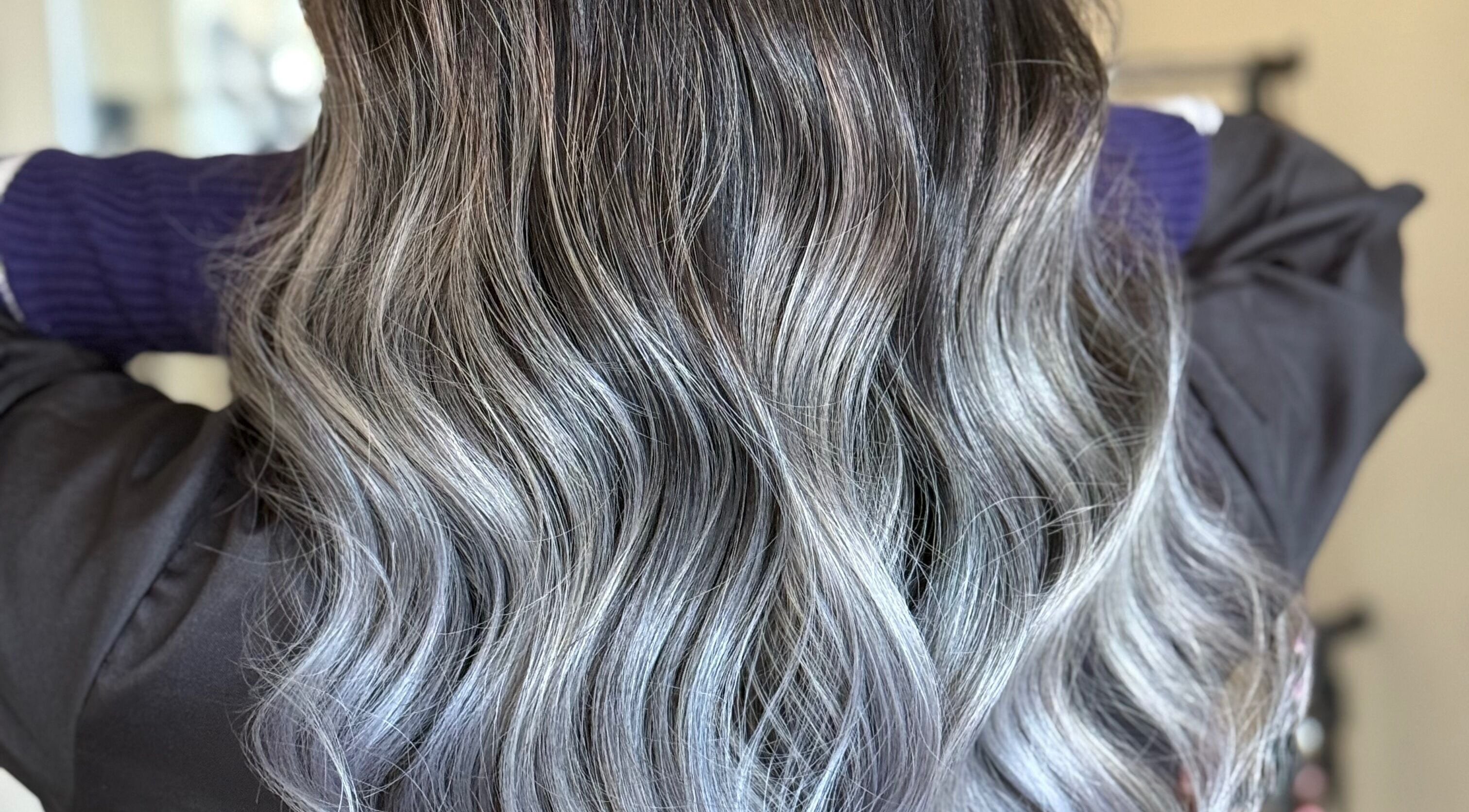 Sleek silver wavy hairstyle crafted at New Style by Maye in Melbourne, Victoria, AU.