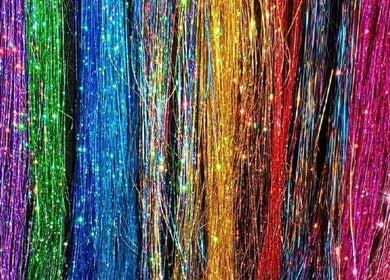 Colorful hair tinsel display at The Fairy Hair Godmother®️ in High Point, North Carolina, US.