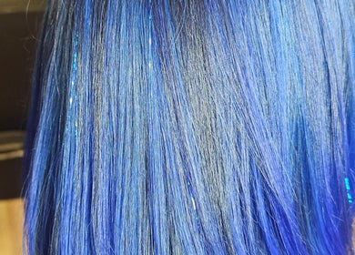 Vibrant blue hair at The Fairy Hair Godmother®️ in High Point, North Carolina, US.