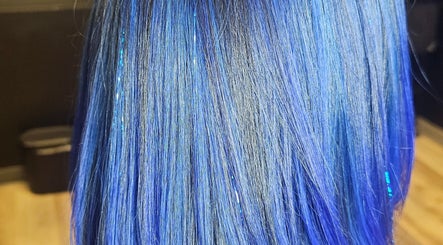 Vibrant blue hair at The Fairy Hair Godmother®️ in High Point, North Carolina, US.