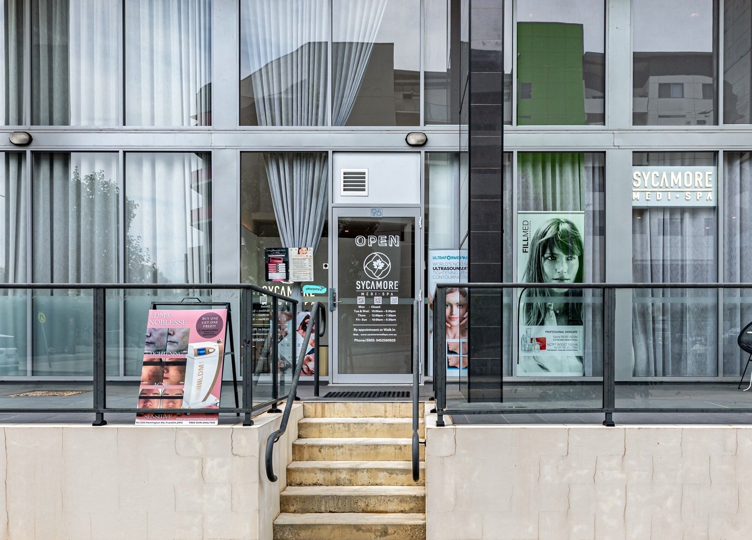 Entrance of Sycamore Medi Spa - Franklin, showcasing modern glass doors in Franklin, Australian Capital Territory, AU.