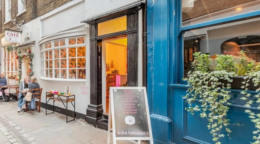 Entrance of Aura Organics Spa - Greenwich in London, England, GB, showcasing a welcoming vintage style.