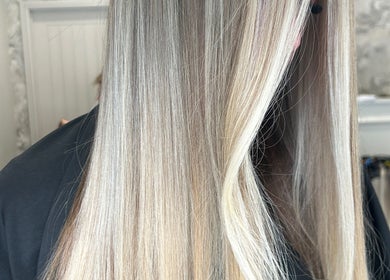 Silky blonde hair shines beautifully at Nataliejadehairskin.co, Swinton, England, GB.