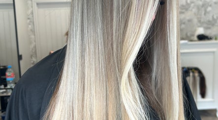Silky blonde hair shines beautifully at Nataliejadehairskin.co, Swinton, England, GB.