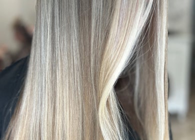 Silky blonde hair styled at Nataliejadehairskin.co, Swinton, England, GB capturing refined beauty.