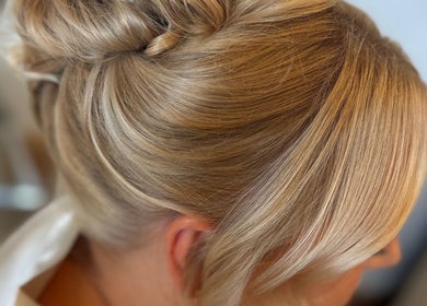 Detailed view of a sophisticated blonde updo at Nataliejadehairskin.co in Swinton, England, GB.