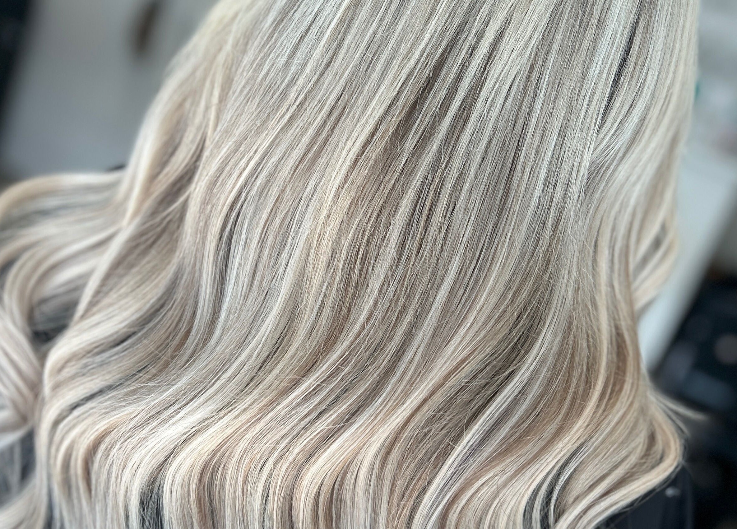 Flowing blonde hair styled at Nataliejadehairskin.co, Swinton, England, GB.
