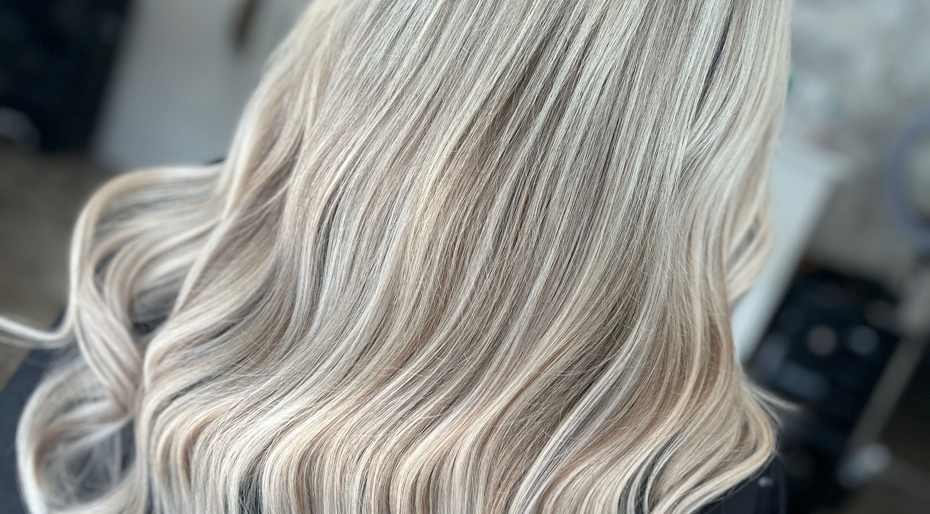 Flowing blonde hair styled at Nataliejadehairskin.co, Swinton, England, GB.