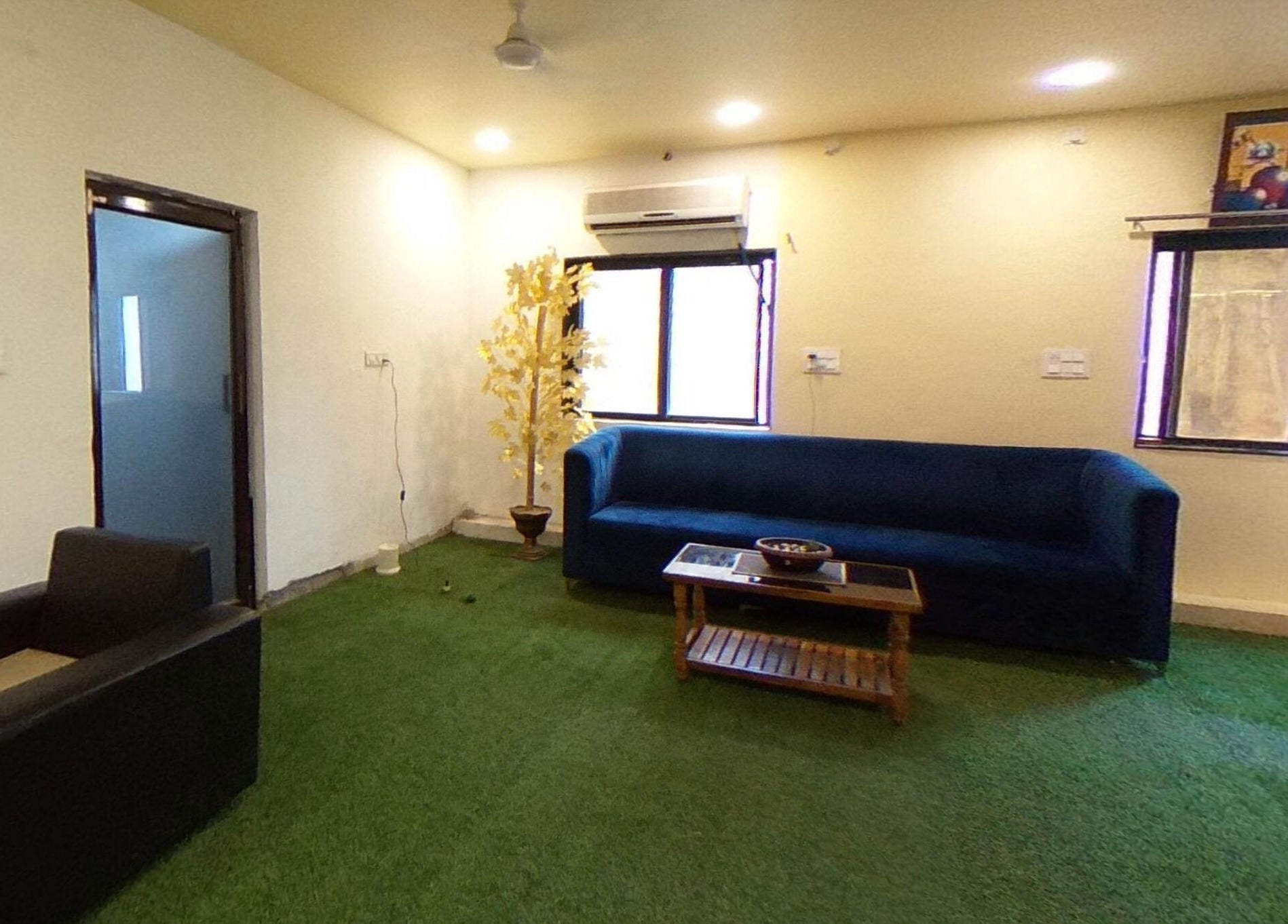 Comfortable lounge at Absolute Ace Unisex Spa and Salon, Raipur, Chhattisgarh, IN with plush seating and decor.