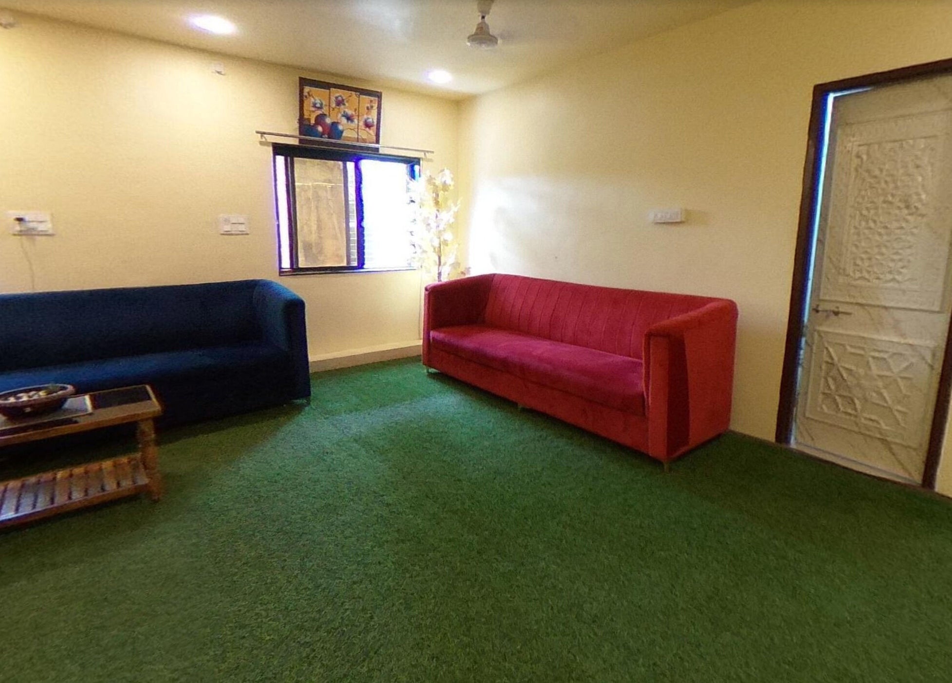 Inviting lounge at Absolute Ace Unisex Spa and Salon in Raipur, Chhattisgarh, IN with vibrant sofas and decor.