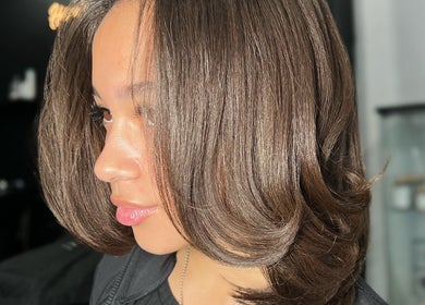 Styled hair at Opulence TORONTO pop-up in Toronto, Ontario, CA showcasing sleek, glossy hair.