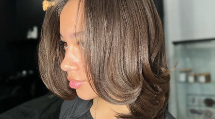 Styled hair at Opulence TORONTO pop-up in Toronto, Ontario, CA showcasing sleek, glossy hair.