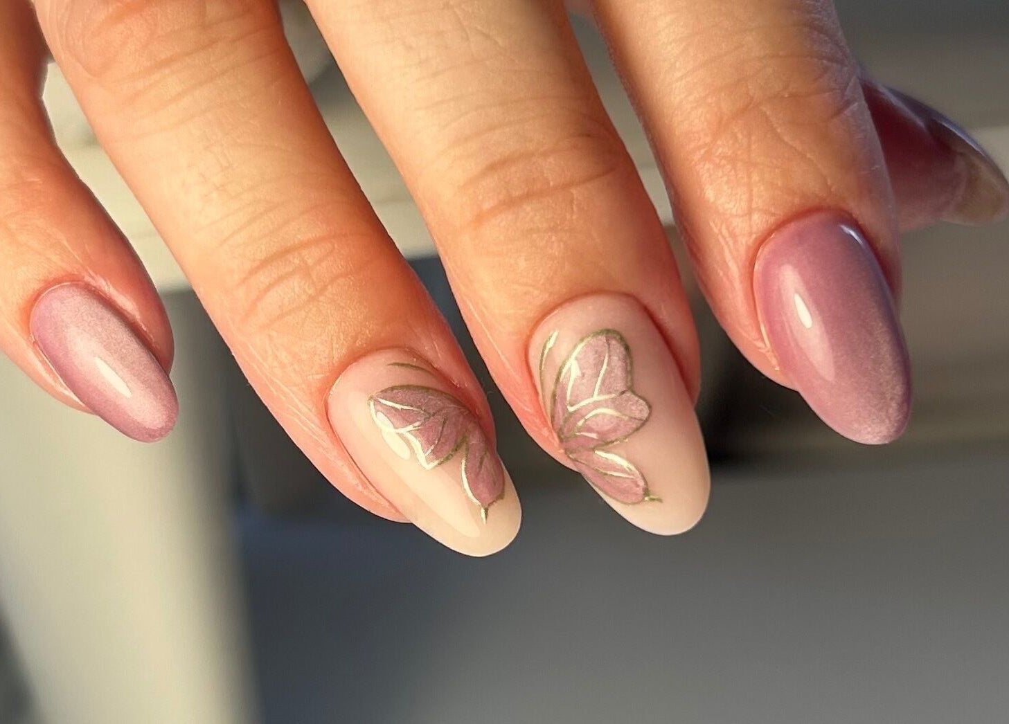 Elegant floral nail art at Nails by Hallie, Four Lanes, England, GB. Perfect for a stylish manicure.