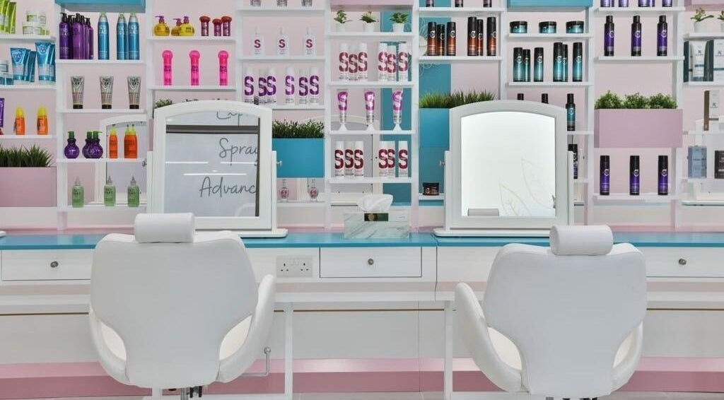 Modern salon interior at Refresh Hair & Beauty Bar, Dubai, Dubai, AE with stylish products on display.