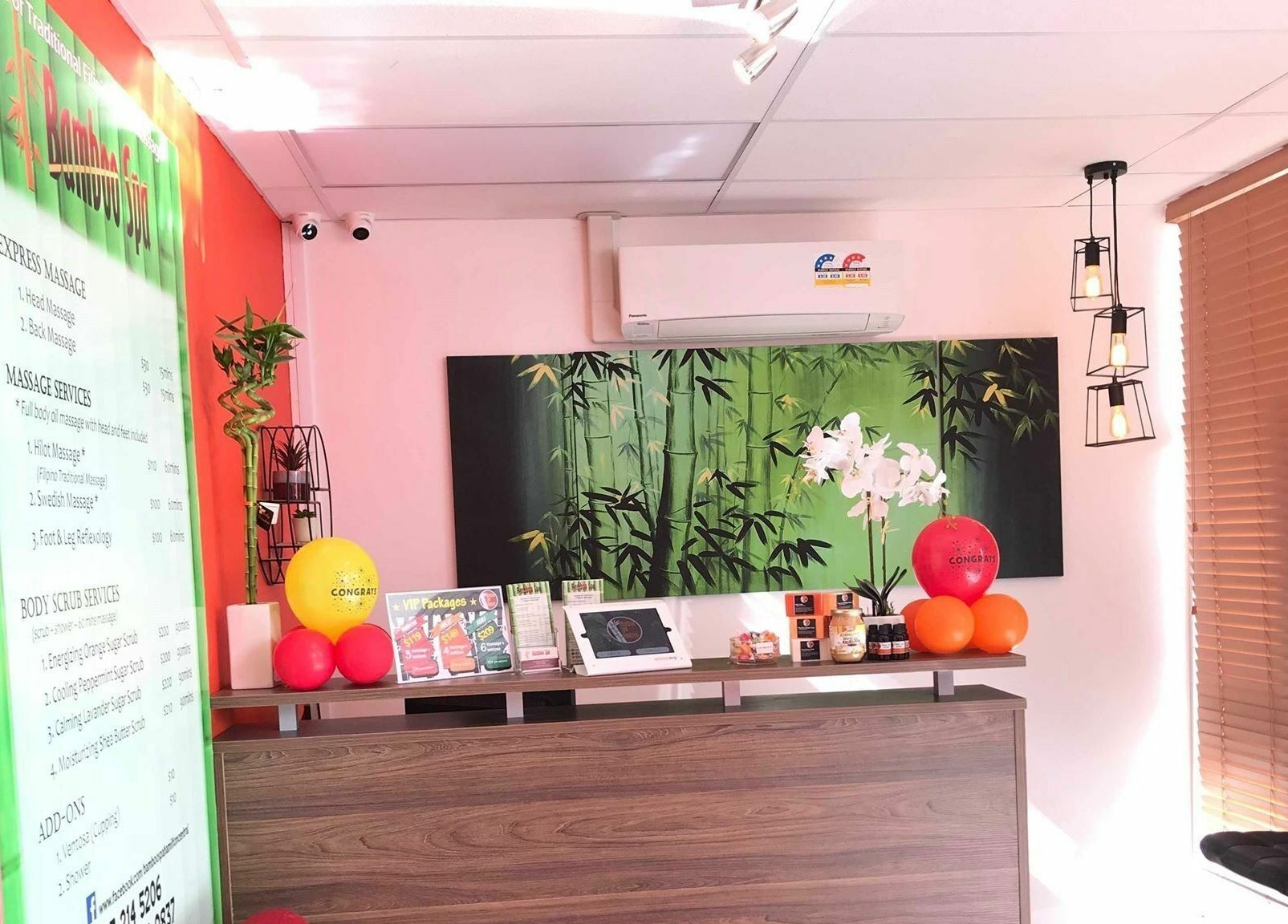 Reception area of Bamboo Spa Hamilton, featuring lush bamboo artwork in Hamilton, Waikato, NZ.