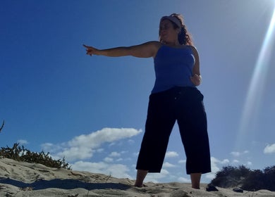 Giovanna Baistrocchi demonstrates energy therapy outdoors in Craigavon, Northern Ireland, GB.