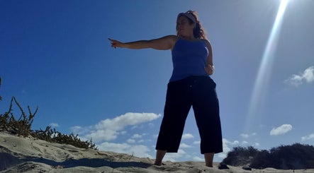 Giovanna Baistrocchi demonstrates energy therapy outdoors in Craigavon, Northern Ireland, GB.