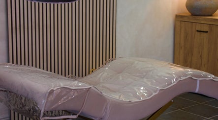 Luxurious massage bed at Bloom Beauty, Tipperary, IE, offering relaxation and wellness experiences.