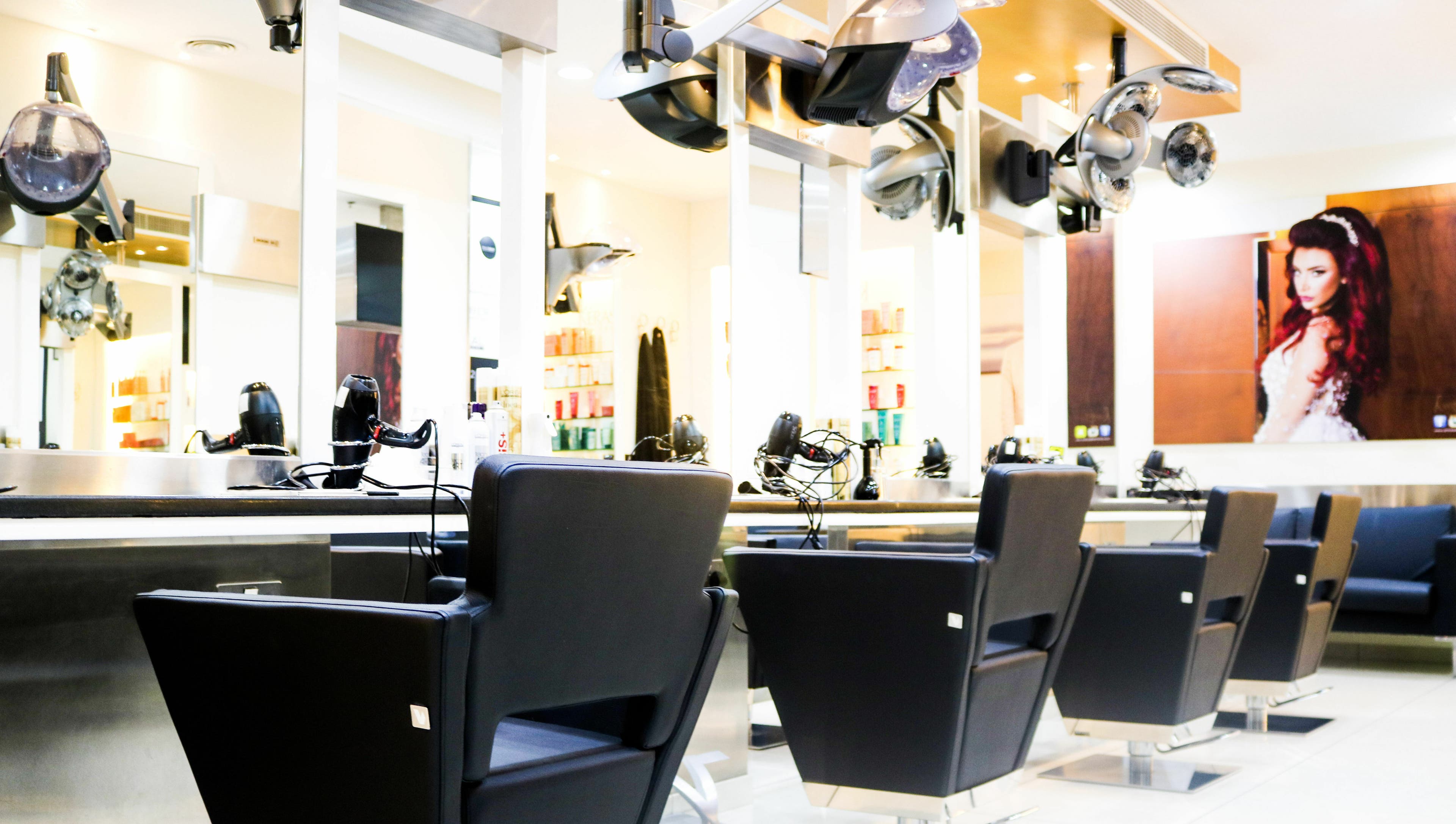 Modern salon chairs and hair styling equipment at Amro - Hilton Dubai Palm Jumeirah, Dubai, Dubai, AE.