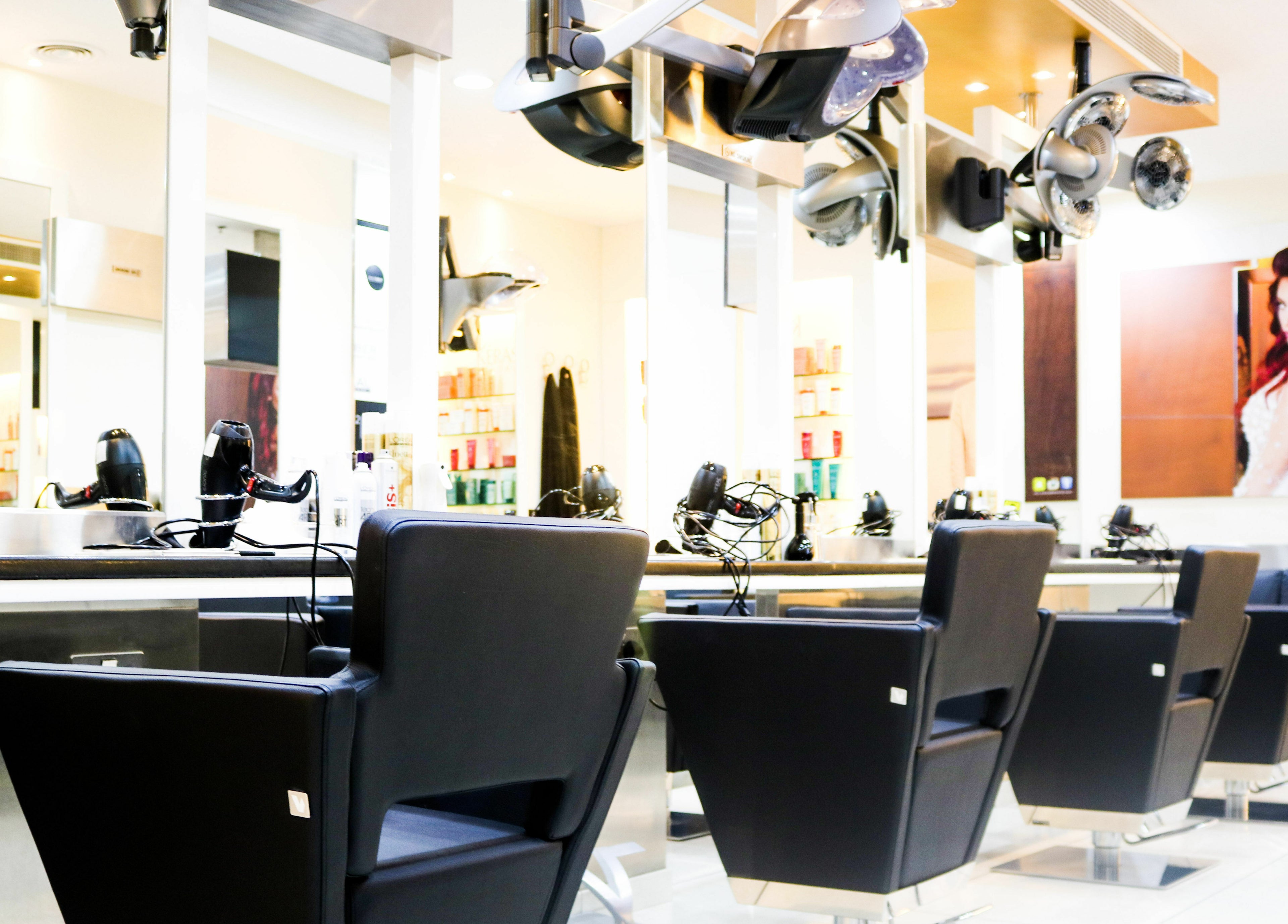 Modern salon chairs and hair styling equipment at Amro - Hilton Dubai Palm Jumeirah, Dubai, Dubai, AE.