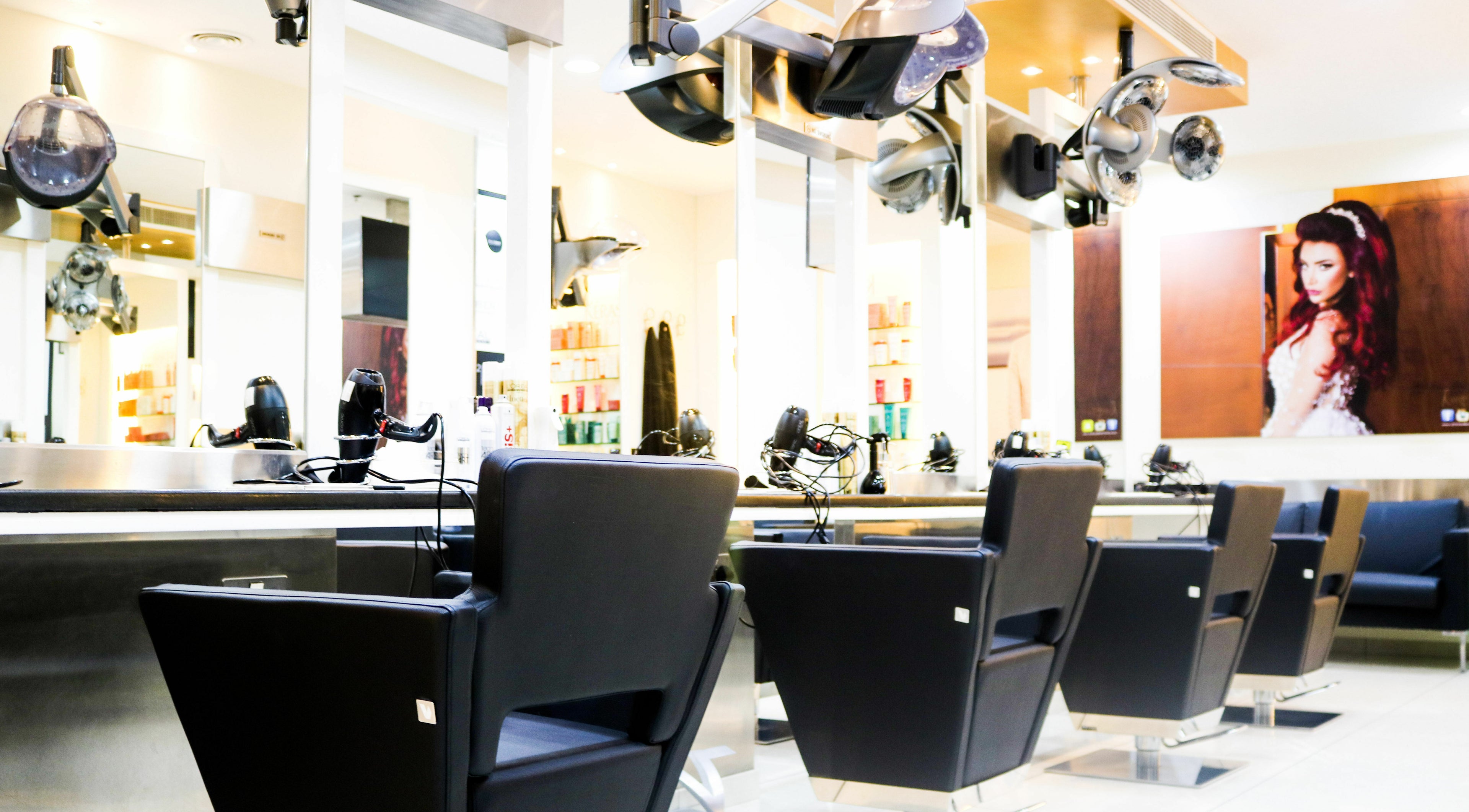 Modern salon chairs and hair styling equipment at Amro - Hilton Dubai Palm Jumeirah, Dubai, Dubai, AE.