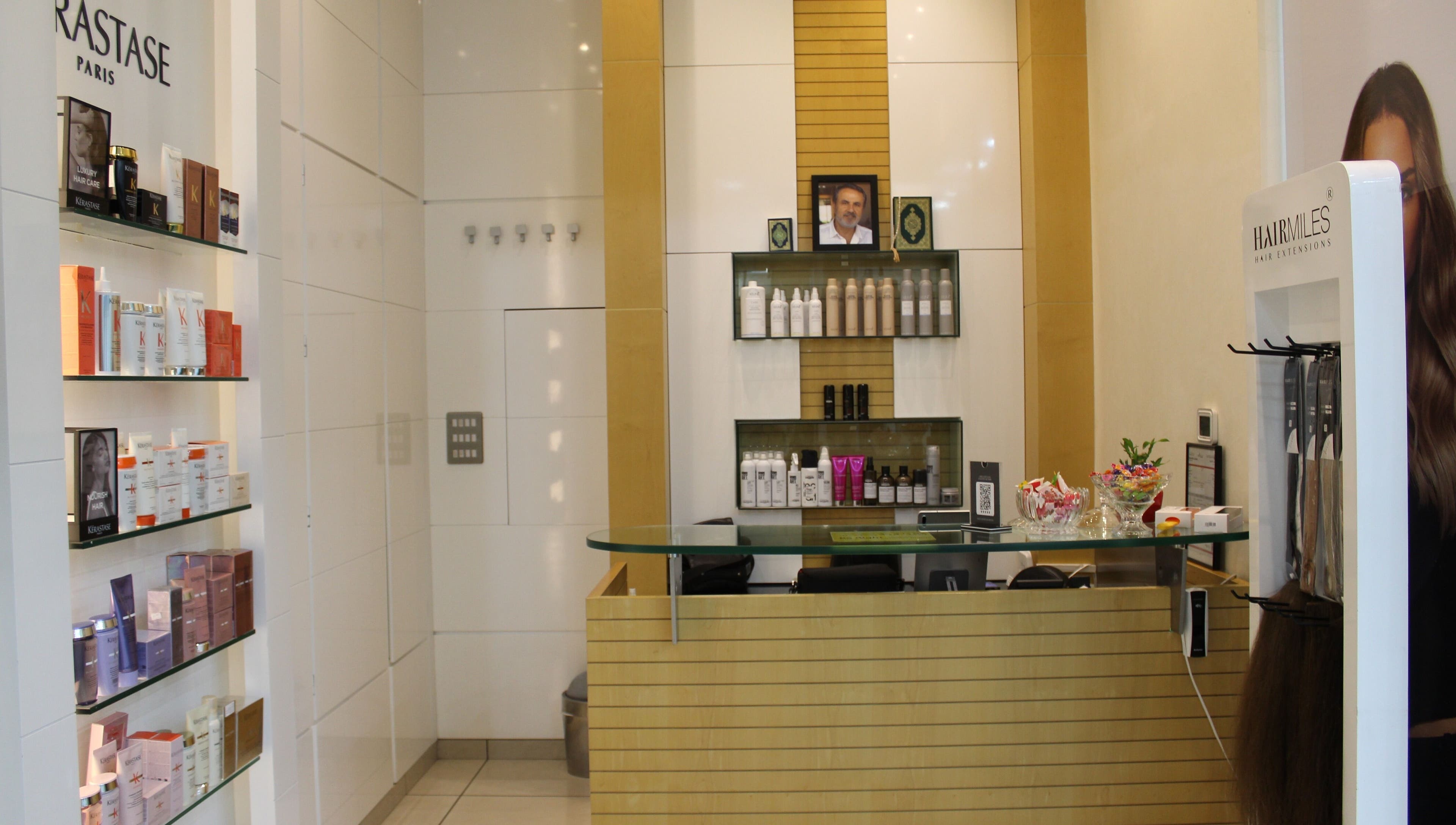 Elegant reception area at Amro - The Collection Mall - Abu Dhabi, offering premium beauty products. Abu Dhabi, AE.