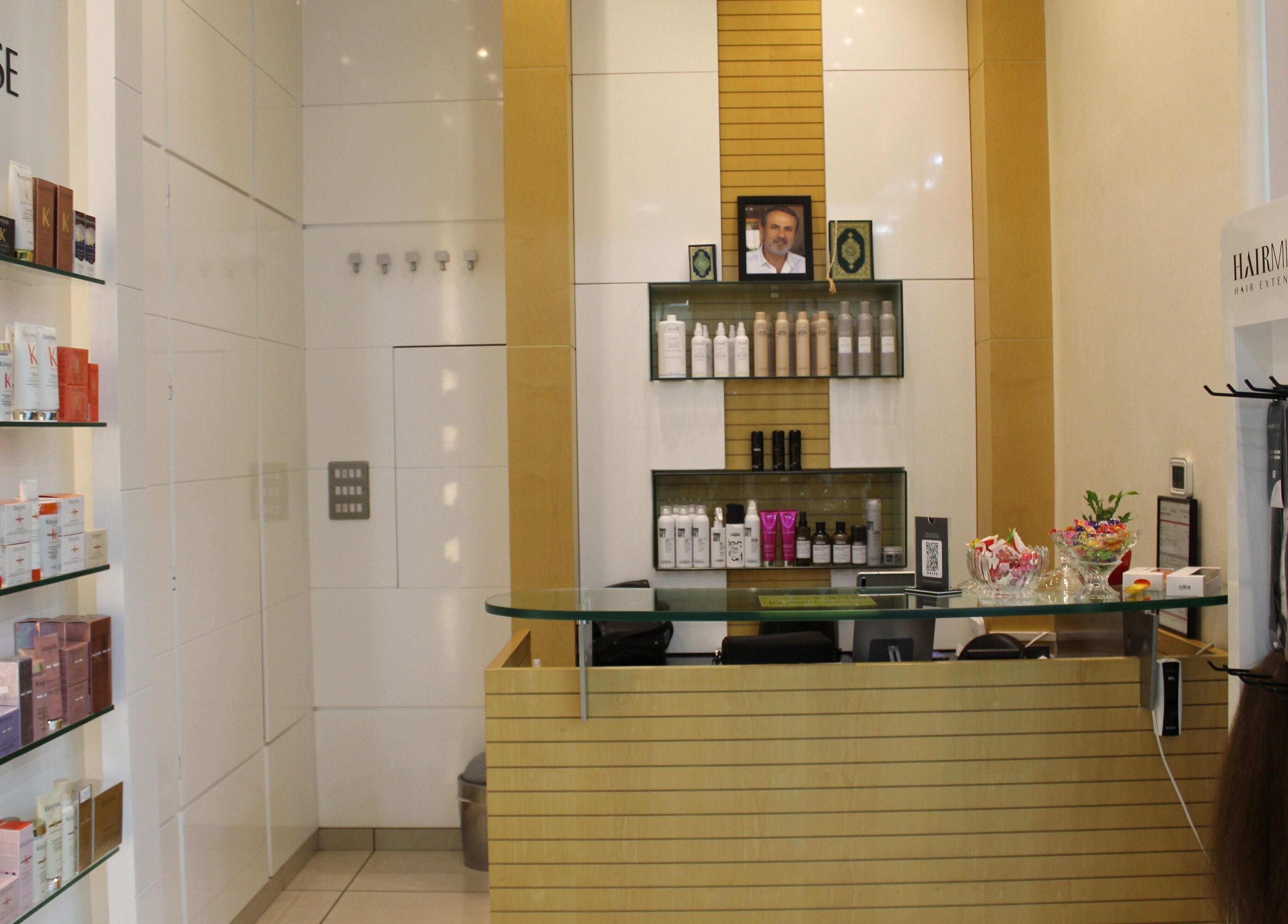 Elegant reception area at Amro - The Collection Mall - Abu Dhabi, offering premium beauty products. Abu Dhabi, AE.