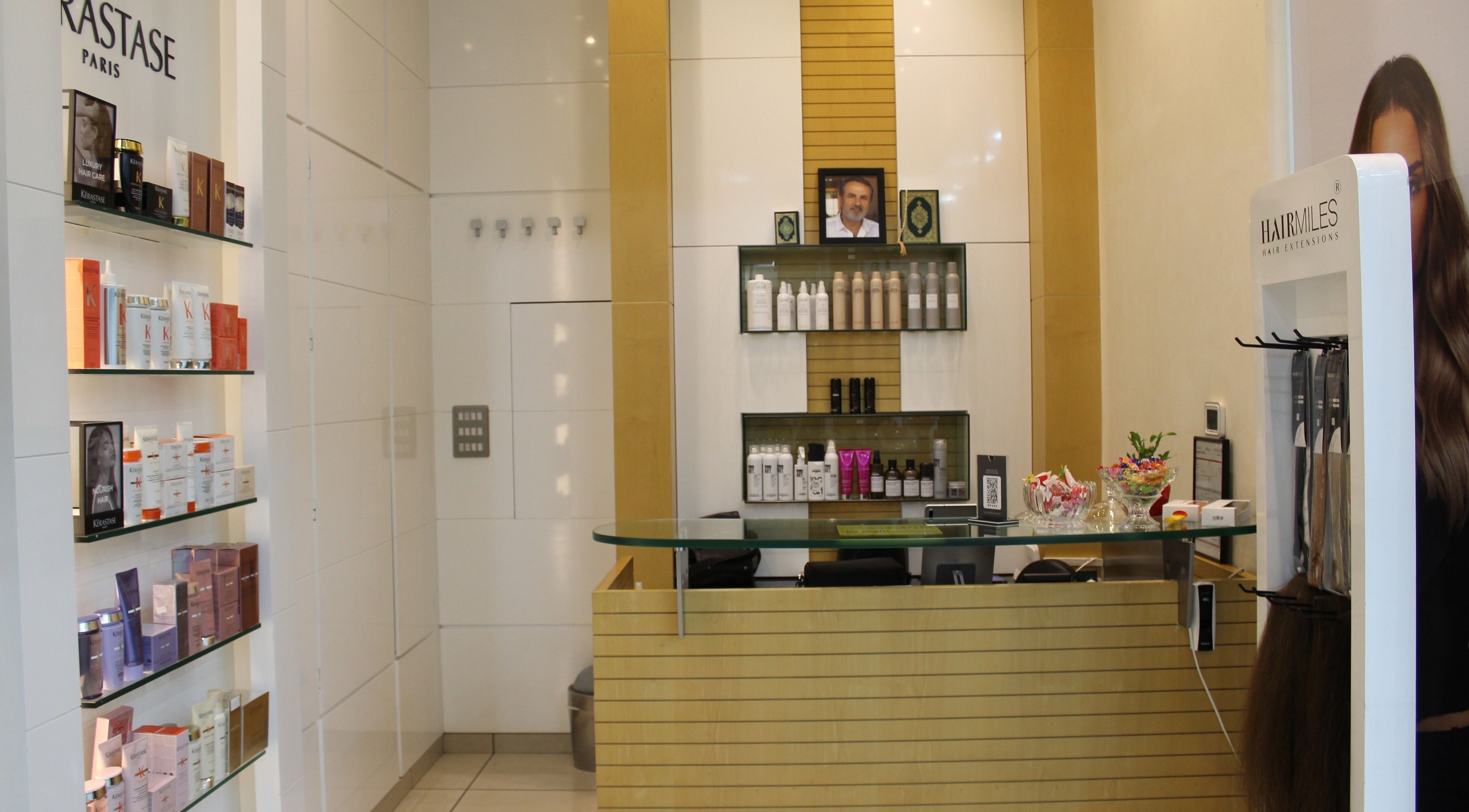 Elegant reception area at Amro - The Collection Mall - Abu Dhabi, offering premium beauty products. Abu Dhabi, AE.
