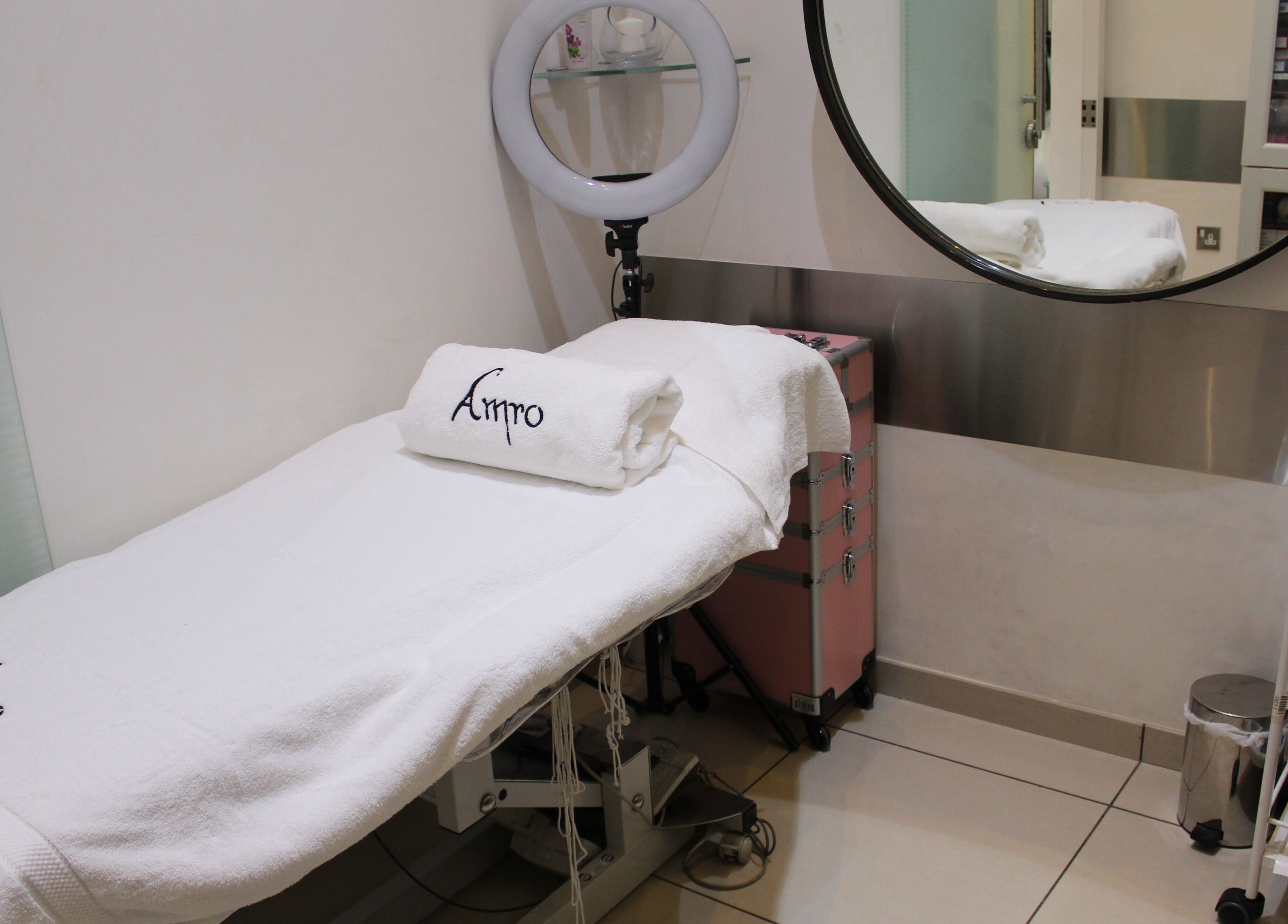 Treatment room at Amro - St.Regis Saadiyat Island - Abu Dhabi, featuring a plush bed and serene decor.