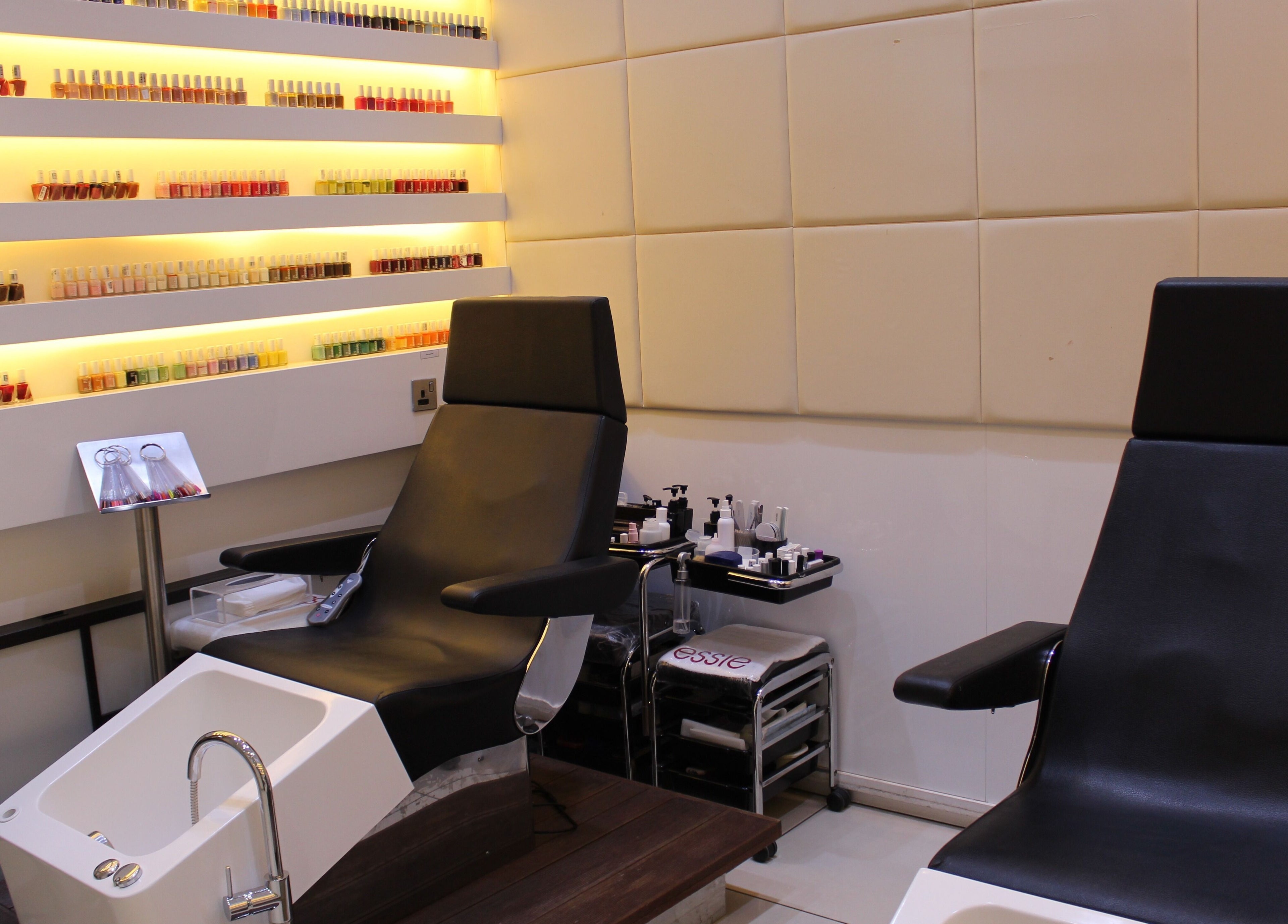 Elegantly designed pedicure chairs at Amro - St.Regis Saadiyat Island - Abu Dhabi, offering luxurious services.