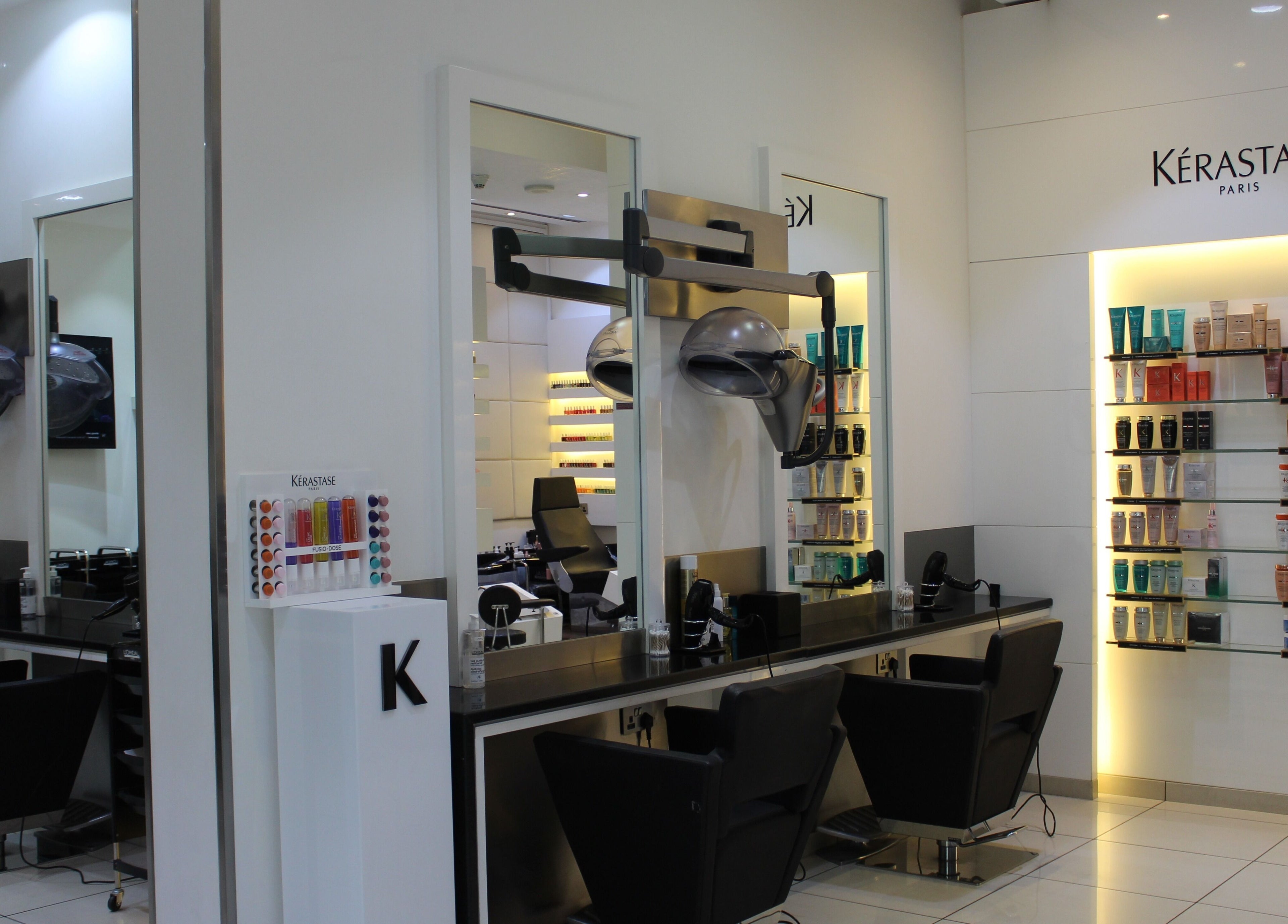 Sophisticated salon interior at Amro - St.Regis Saadiyat Island - Abu Dhabi, displaying premium products.