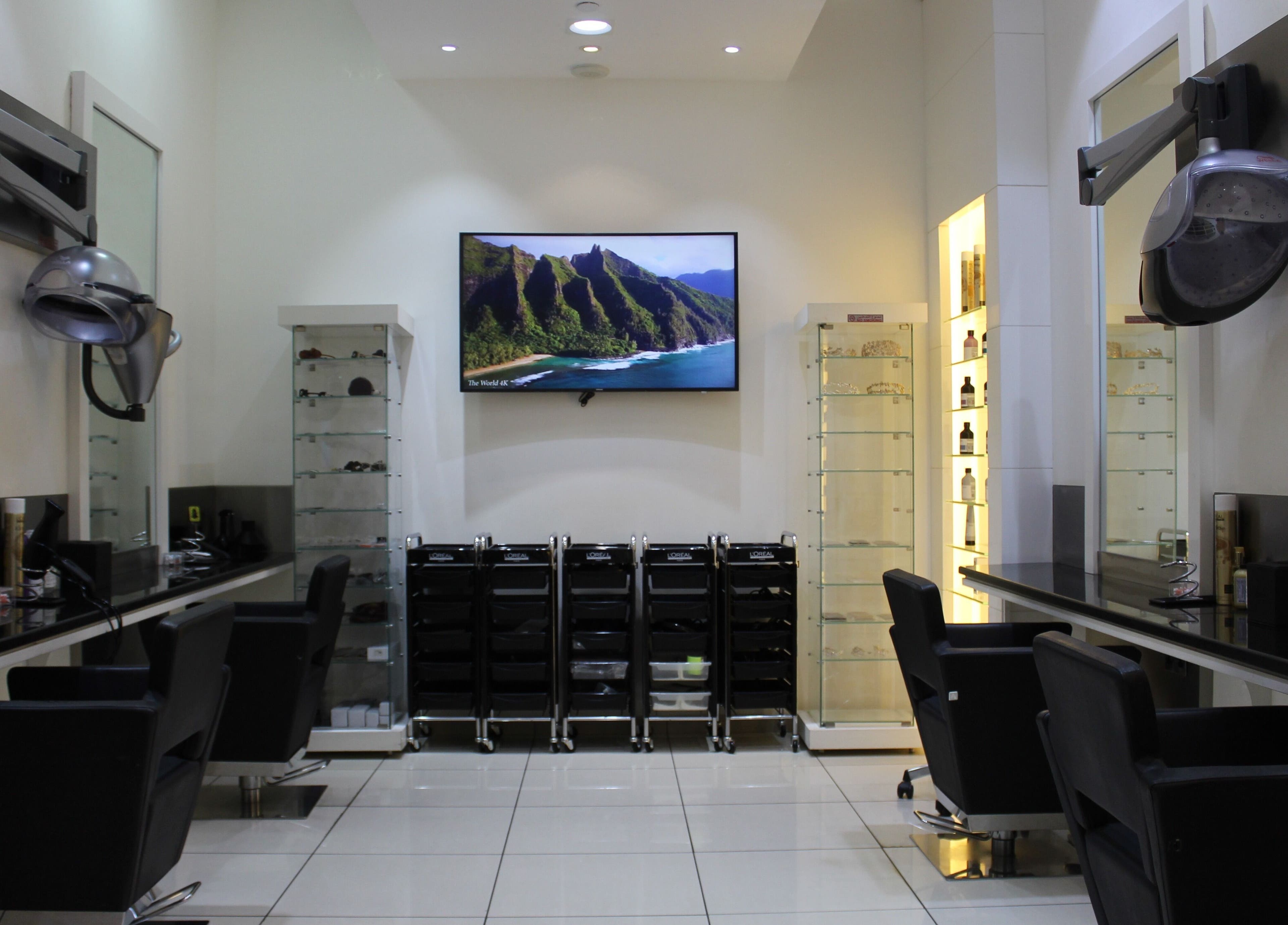 Interior of Amro - St.Regis Saadiyat Island - Abu Dhabi salon with modern styling stations. Abu Dhabi, AE.