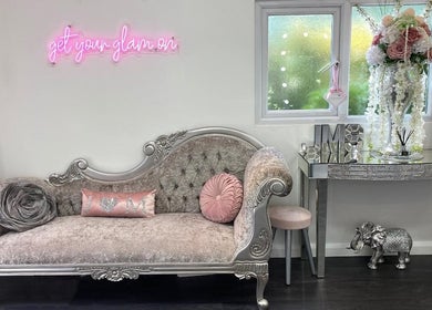 Elegant lounge at Jessica Marie Essex, Loughton, England, GB, with plush sofa and chic decor highlights.