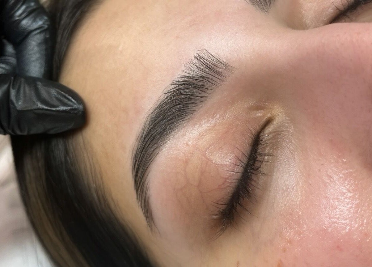 Expert eyebrow treatment at Madeline’s Beauty Room, Derby, England, GB, showcasing precise grooming.