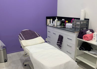 Relaxing treatment room at Trends Hair Beauty and Nails, Christchurch, Canterbury, NZ with purple accent wall.