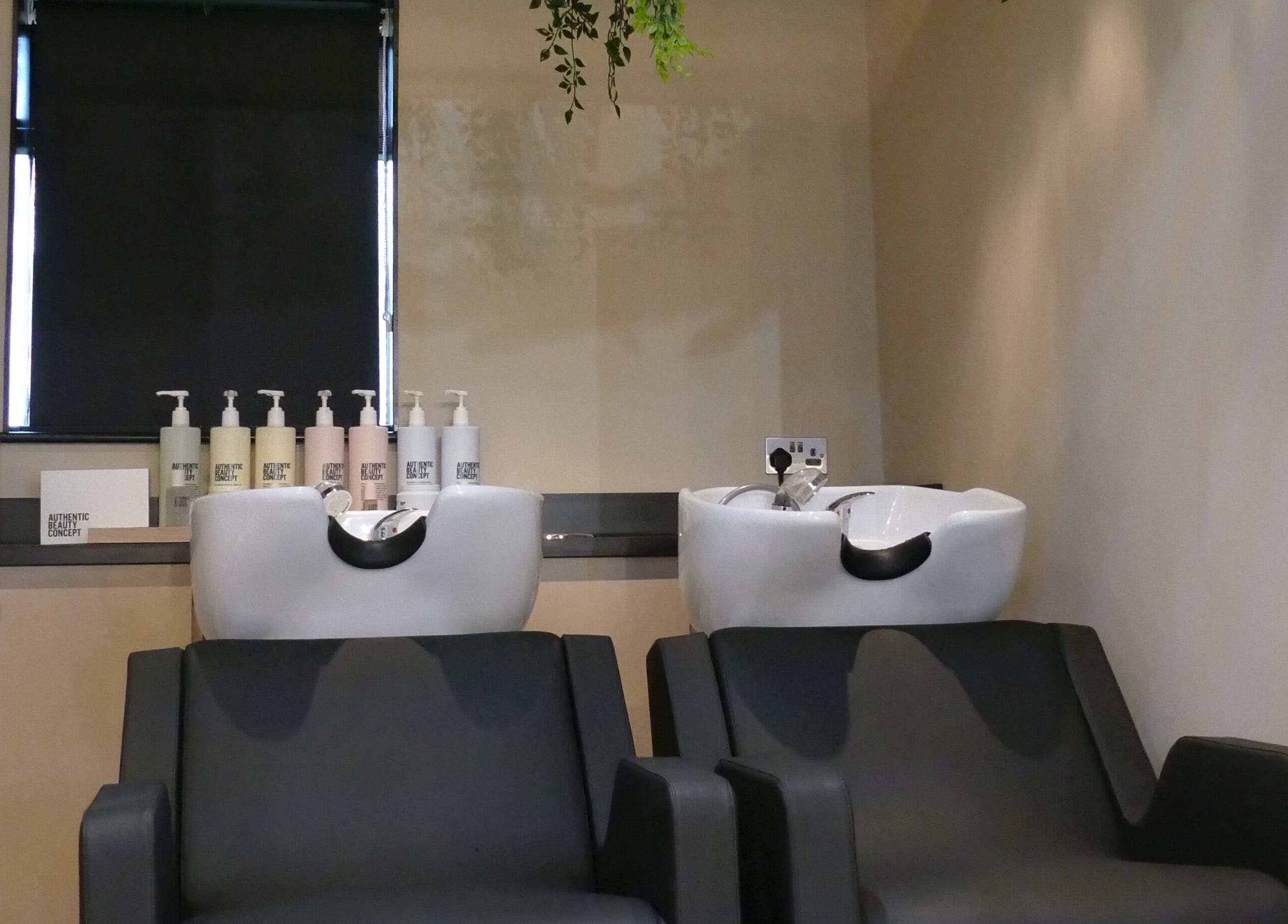 Sleek wash stations at The Curl Girl, Sugnall, England, GB for a soothing hair care experience.