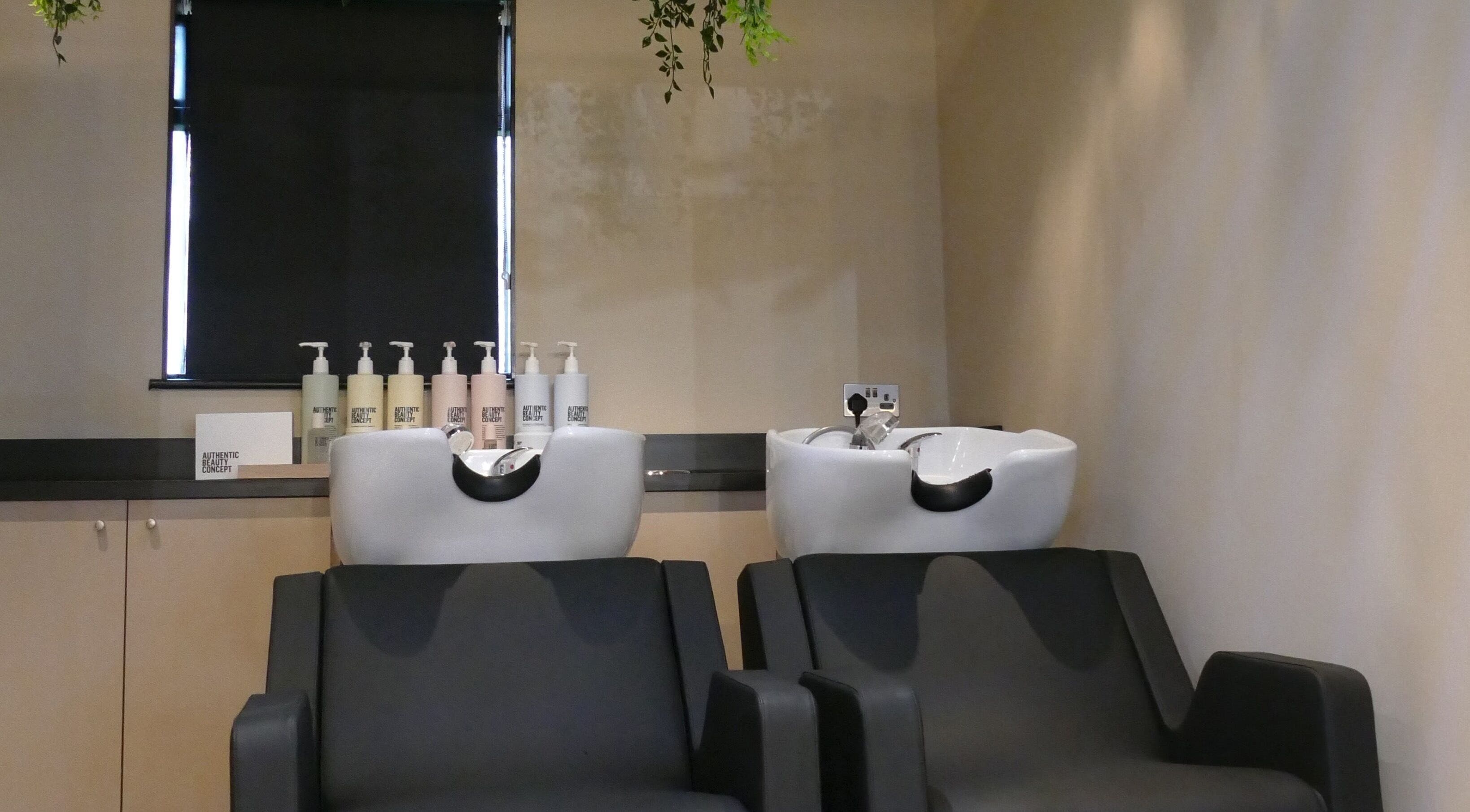Sleek wash stations at The Curl Girl, Sugnall, England, GB for a soothing hair care experience.