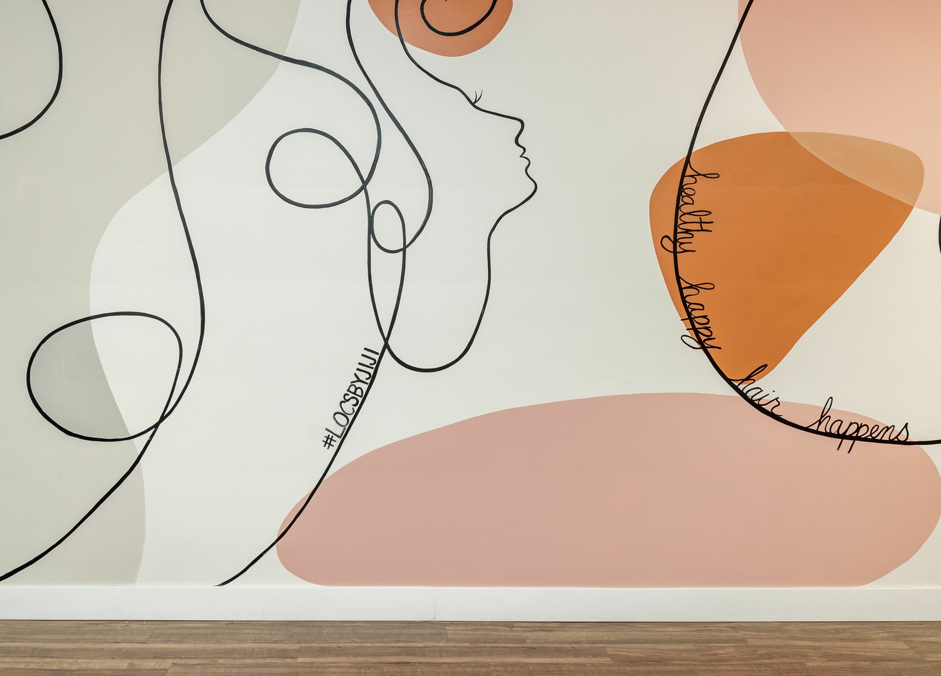 Modern abstract mural at Locs by Jiji in Toronto, Ontario, CA, symbolizes beauty and wellness.