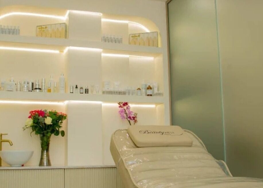 Elegant treatment room at The Beauty Nest, London, England, GB, showcasing luxurious decor and skincare products.