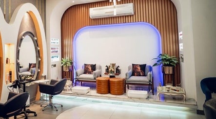 Relaxing seating area at Morya Beauty Centre in Sharjah, Sharjah, AE, showcasing modern decor and comfortable chairs.
