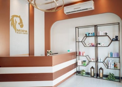 Stylish reception at Morya Beauty Centre, Sharjah, Sharjah, AE with modern decor and product display.