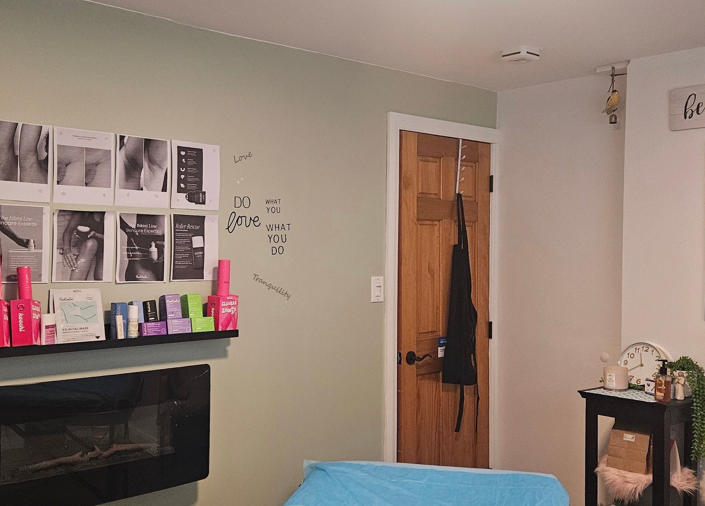 Pure Waxing salon room in Quinte West, Ontario, CA, with skincare products and cozy decor.