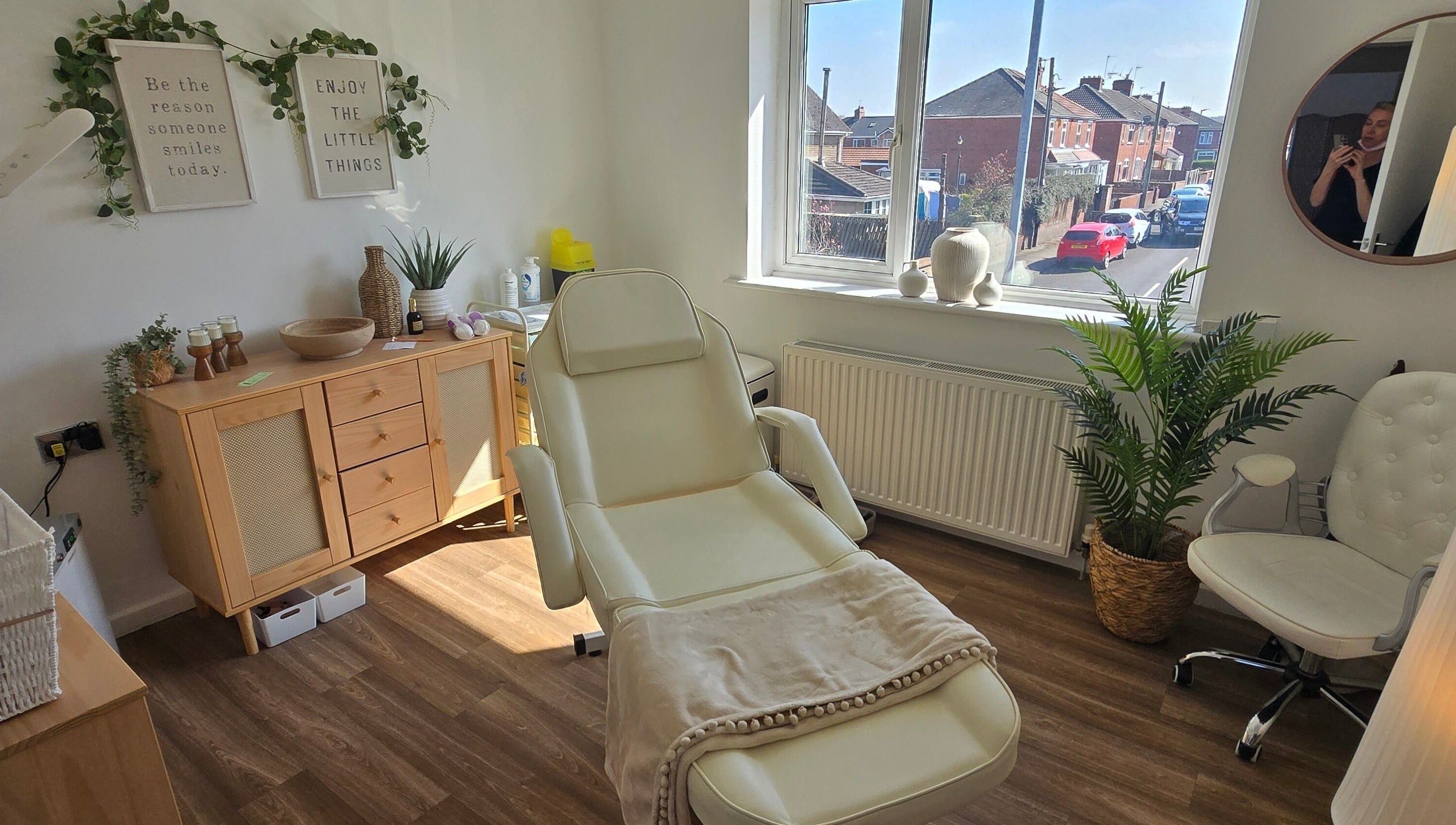Relaxing treatment room at U Aesthetics, South Elmsall, England, GB, highlighting a comfortable chair and soothing decor.